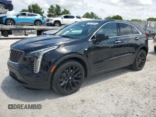 2023 Cadillac XT4 FWD Luxury z VIN 1GYAZAR47PF107473, wystawiony jako Copart lot #59137665 z przebiegiem 9 198 mil mil oraz Szkoda całkowita • Salvage title. Historia ofert i sprzedaży dostępna na DreamBid. Obrazek 1.