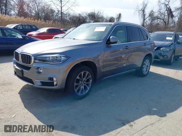 2015 BMW X5 xDrive35i with VIN 5UXKR0C53F0K60910, listed as a IAAI auction lot 41857733 with 153,583 mi miles. Bid and sale history available at carsss.com. Image 19.