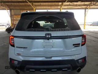 2023 Honda Passport TrailSport z VIN 5FNYF8H68PB000476, wystawiony jako Copart lot #55079045 z przebiegiem 30 543 mil mil oraz Szkody całkowita. Historia ofert i sprzedaży dostępna na DreamBid. Obrazek 6.
