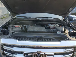 2022 GMC Sierra 1500 Limited SLE with VIN 3GTU9BEDXNG119577, listed as a Copart auction lot 70164644 with 101,323 mi miles and Salvage Title. Bid and sale history available at carsss.com. Image 11.