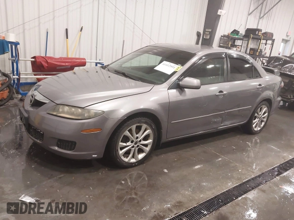 2006 Mazda 6 i with VIN 1YVFP80C865M23087, listed as a IAAI auction lot 41412551 with 148,395 mi miles and . Bid and sale history available at carsss.com. Image 2.