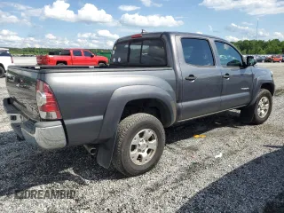 2014 Toyota Tacoma PreRunner z VIN 5TFJU4GN2EX054013, wystawiony jako Copart lot #56953795 z przebiegiem 183 484 mil mil oraz Szkoda całkowita • Salvage title. Historia ofert i sprzedaży dostępna na DreamBid. Obrazek 3.