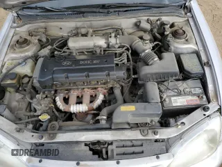 1999 Hyundai Elantra z VIN KMHJF25F8XU852123, wystawiony jako Copart lot #72284584 z przebiegiem 12 750 mil mil oraz Czysty tytuł • Clean title. Historia ofert i sprzedaży dostępna na DreamBid. Obrazek 11.