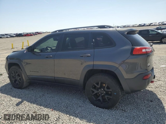 2015 Jeep Cherokee Trailhawk z VIN 1C4PJMBS2FW610618, wystawiony jako Copart lot #52243625 z przebiegiem 136 234 mil mil oraz Szkoda całkowita • Salvage title. Historia ofert i sprzedaży dostępna na DreamBid. Obrazek 2.