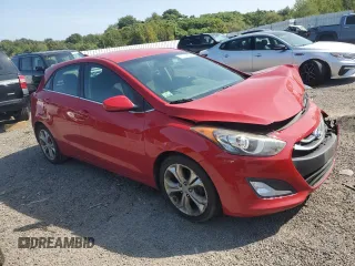 2013 Hyundai Elantra GT with VIN KMHD35LE4DU082855, listed as a Copart auction lot 71051354 with 127,040 mi miles and Salvage Title. Bid and sale history available at carsss.com. Image 4.