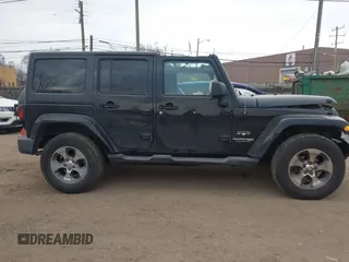 2018 Jeep Wrangler JK Unlimited Altitude with VIN 1C4BJWEG1JL843963, listed as a IAAI auction lot 41287894 with 120,701 mi miles. Bid and sale history available at carsss.com. Image 14.