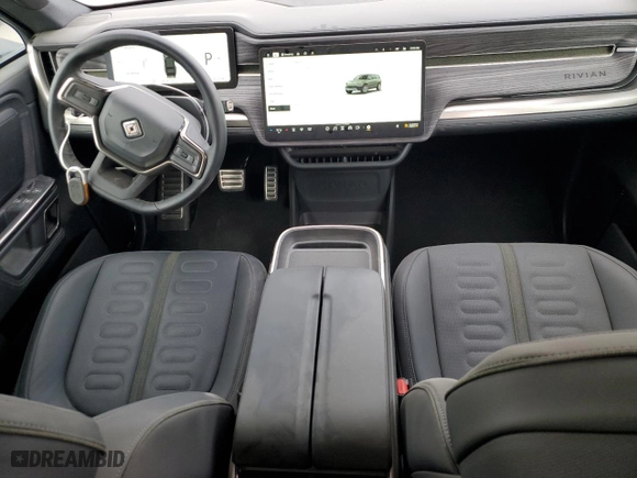 2023 Rivian R1S Launch Edition with VIN 7PDSGABL6PN022754, listed as a Copart auction lot 76849534 with 1,576 mi miles and Salvage Title. Bid and sale history available at carsss.com. Image 8.