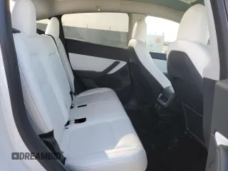 2020 Tesla Model Y Long Range with VIN 5YJYGDEFXLF034617, listed as a Copart auction lot 53235235 with 113,480 mi miles and Salvage Title. Bid and sale history available at DreamBid. Image 10.