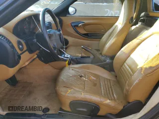 2000 Porsche Boxster z VIN WP0CA2980YU626358, wystawiony jako Copart lot #36977344 z przebiegiem 117 561 mil mil oraz Szkoda całkowita • Salvage title. Historia ofert i sprzedaży dostępna na DreamBid. Obrazek 7.