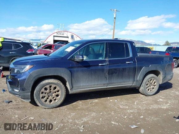 2022 Honda Ridgeline RTL-E with VIN 5FPYK3F71NB013522, listed as a IAAI auction lot 41670347 with 24,689 mi miles and . Bid and sale history available at DreamBid. Image 14.