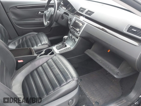 2014 Volkswagen CC Lux with VIN WVWRP7AN3EE537770, listed as a IAAI auction lot 41385247 with 135,069 mi miles. Bid and sale history available at carsss.com. Image 5.
