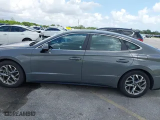 2023 Hyundai Sonata SEL with VIN KMHL64JA0PA270047, listed as a IAAI auction lot 42022365 with 57,904 mi miles. Bid and sale history available at carsss.com. Image 15.