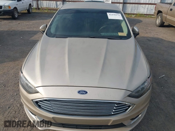 2018 Ford Fusion SE z VIN 3FA6P0HD6JR279927, wystawiony jako IAAI lot #42430172 z przebiegiem 145 080 mil mil oraz . Historia ofert i sprzedaży dostępna na DreamBid. Obrazek 6.