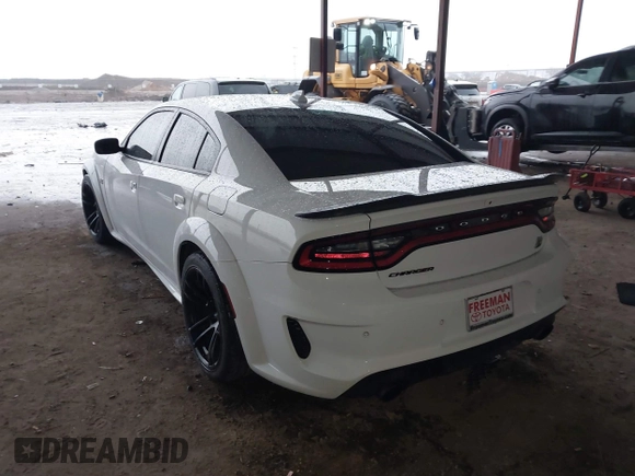 2023 Dodge Charger Scat Pack Widebody with VIN 2C3CDXGJ9PH516473, listed as a IAAI auction lot 41188167 with 38,021 mi miles and . Bid and sale history available at DreamBid. Image 3.