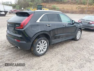 2023 Cadillac XT4 AWD Luxury with VIN 1GYFZBR42PF103973, listed as a IAAI auction lot 41902923 with 70,571 mi miles and . Bid and sale history available at DreamBid. Image 4.