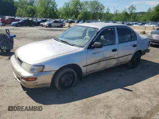 1997 Toyota Corolla with VIN 2T1BA02E6VC168589, listed as a Copart auction lot 57182405 with 219,303 mi miles and Salvage title. Bid and sale history available at DreamBid. Image 1.