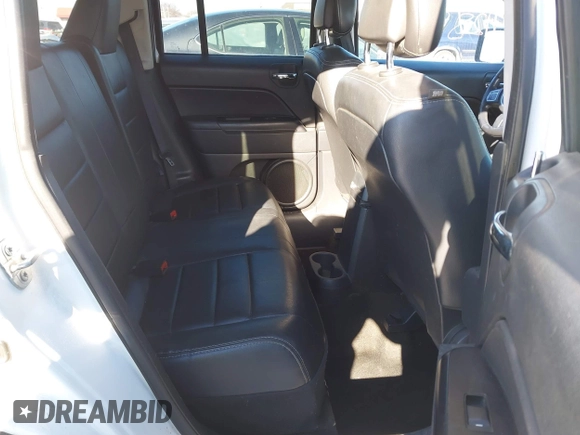 2015 Jeep Patriot High Altitude with VIN 1C4NJRAB4FD381232, listed as a IAAI auction lot 41289384 with 121,581 mi miles and . Bid and sale history available at DreamBid. Image 8.