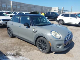 2015 MINI Hardtop 4 Door with VIN WMWXS5C55FT833925, listed as a IAAI auction lot 42505034 with 89,521 mi miles and . Bid and sale history available at DreamBid. Image 1.