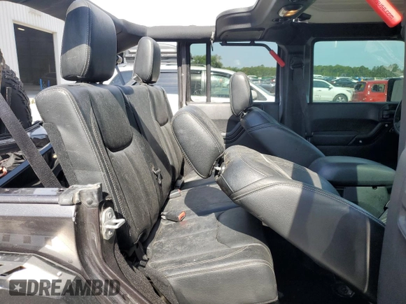 2016 Jeep Wrangler Unlimited Rubicon with VIN 1C4BJWFG8GL192077, listed as a Copart auction lot 58339005 with 62,076 mi miles and Salvage title. Bid and sale history available at DreamBid. Image 11.