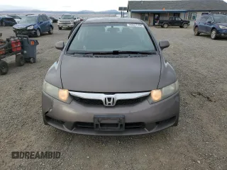 2011 Honda Civic LX-S z VIN 2HGFA1F66BH505257, wystawiony jako Copart lot #80657104 z przebiegiem 134 531 mil mil oraz Szkoda całkowita • Salvage title. Historia ofert i sprzedaży dostępna na DreamBid. Obrazek 5.