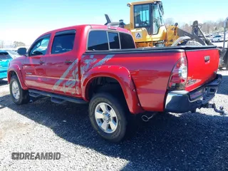 2014 Toyota Tacoma with VIN 5TFLU4EN4EX095917, listed as a IAAI auction lot 41820691 with 59,823 mi miles and . Bid and sale history available at DreamBid. Image 3.