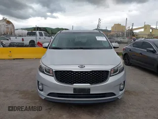 2016 Kia Sedona EX with VIN KNDMC5C13G6100420, listed as a IAAI auction lot 41785604 with 142,677 mi miles. Bid and sale history available at carsss.com. Image 6.