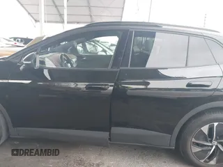 2021 Volkswagen ID.4 Pro S z VIN WVGTMPE26MP065481, wystawiony jako IAAI lot #41719800 z przebiegiem Nie podano mil oraz . Historia ofert i sprzedaży dostępna na DreamBid. Obrazek 15.