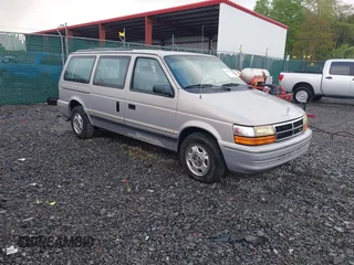 1992 Dodge Caravan Grand SE z VIN 1B4GH44R5NX258694, wystawiony jako IAAI lot #42197603 z przebiegiem 152 591 mil mil oraz . Historia ofert i sprzedaży dostępna na DreamBid. Obrazek 1.