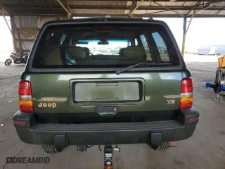 1995 Jeep Grand Cherokee Limited with VIN 1J4GZ78Y2SC723898, listed as a Copart auction lot 54142035 with 173,454 mi miles and Salvage Title. Bid and sale history available at carsss.com. Image 6.