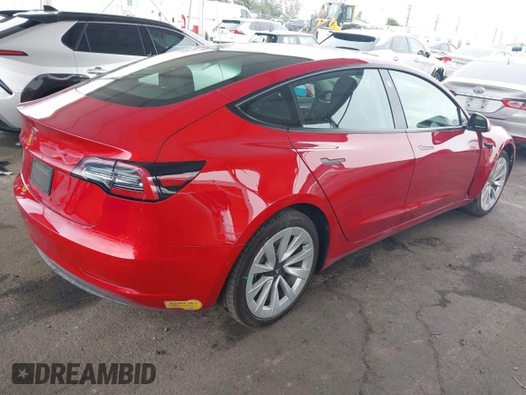 2022 Tesla Model 3 with VIN 5YJ3E1EA8NF177409, listed as a IAAI auction lot 41740718 with 25,557 mi miles. Bid and sale history available at carsss.com. Image 4.