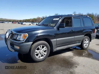 1999 Lexus LX 470 with VIN JT6HT00W7X0027115, listed as a Copart auction lot 52487415 with 293,253 mi miles and Clean Title. Bid and sale history available at DreamBid. Image 1.
