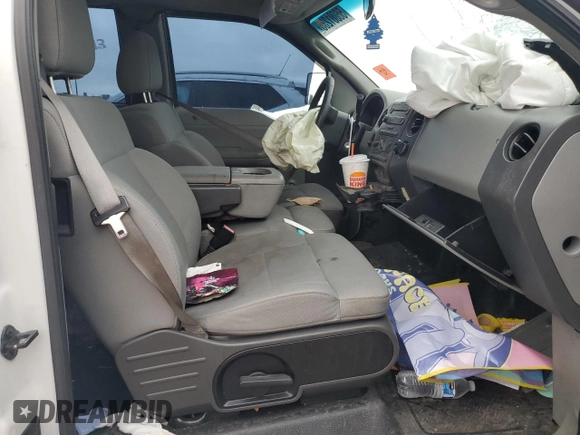 2007 Ford F-150 STX with VIN 1FTRX12W07FA04065, listed as a Copart auction lot 56001235 with Not provided miles and Salvage title. Bid and sale history available at DreamBid. Image 7.