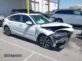 2023 Honda Civic EX-L with VIN 19XFL1H76PE003575, listed as a IAAI auction lot 42328487 with 22,091 mi miles and . Bid and sale history available at DreamBid. Image 1.