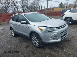 2016 Ford Escape Titanium with VIN 1FMCU9J93GUC55811, listed as a IAAI auction lot 41961519 with 99,878 mi miles. Bid and sale history available at carsss.com. Image 1.