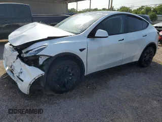2023 Tesla Model Y Long Range with VIN 7SAYGDEE6PA053274, listed as a Copart auction lot 52865175 with Not Provided miles and Salvage Title. Bid and sale history available at DreamBid. Image 1.