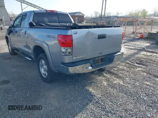 2008 Toyota Tundra 4WD Truck with VIN 5TFBV54148X073823, listed as a IAAI auction lot 42017595 with 33,107 mi miles. Bid and sale history available at carsss.com. Image 3.