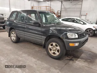 1999 Toyota RAV4 with VIN JT3HP10V4X7128778, listed as a IAAI auction lot 41863696 with 284,463 mi miles and . Bid and sale history available at DreamBid. Image 1.