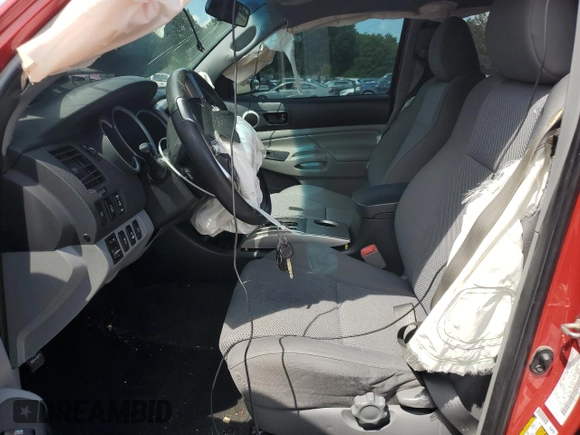 2015 Toyota Tacoma with VIN 3TMLU4EN9FM165421, listed as a Copart auction lot 58547985 with 136,372 mi miles and Salvage title. Bid and sale history available at DreamBid. Image 7.