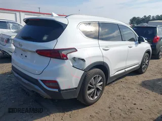 2019 Hyundai Santa Fe SEL with VIN 5NMS33AD3KH024170, listed as a IAAI auction lot 41675929 with 187,209 mi miles and . Bid and sale history available at DreamBid. Image 4.