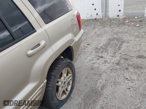 1999 Jeep Grand Cherokee Limited with VIN 1J4GW68SXXC664055, listed as a IAAI auction lot 42339125 with 219,792 mi miles and . Bid and sale history available at DreamBid. Image 15.