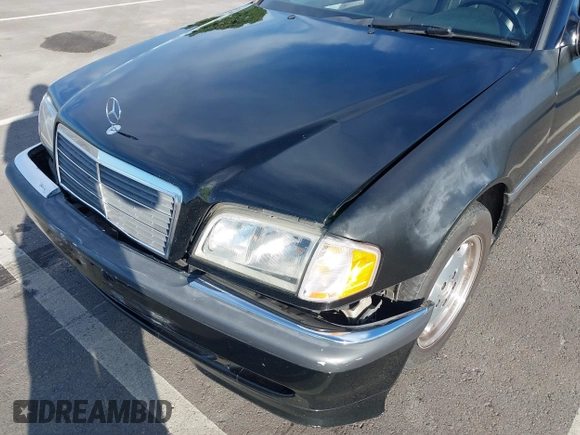 2000 Mercedes-Benz C 230 Kompressor z VIN WDBHA24G4YA799207, wystawiony jako IAAI lot #42010800 z przebiegiem 126 478 mil mil oraz . Historia ofert i sprzedaży dostępna na DreamBid. Obrazek 6.