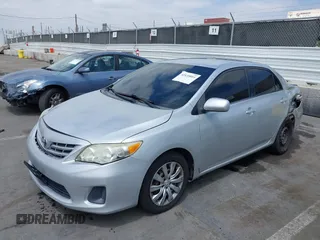2013 Toyota Corolla L with VIN 2T1BU4EE9DC948109, listed as a IAAI auction lot 42136011 with 166,663 mi miles and . Bid and sale history available at DreamBid. Image 17.