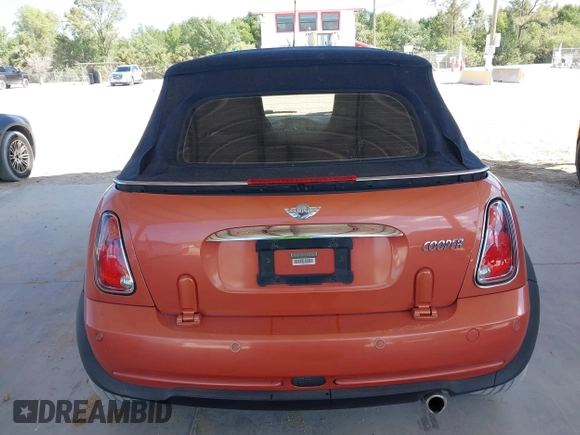 2005 MINI Convertible with VIN WMWRF334X5TF61026, listed as a IAAI auction lot 42125720 with 117,908 mi miles and . Bid and sale history available at DreamBid. Image 17.