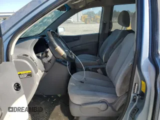 2009 Kia Sedona LX with VIN KNDMB233396275241, listed as a Copart auction lot 77273274 with 219,576 mi miles and Clean Title. Bid and sale history available at carsss.com. Image 7.