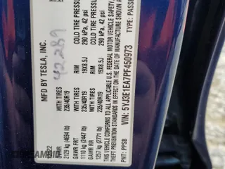 2023 Tesla Model 3 with VIN 5YJ3E1EA7PF450973, listed as a Copart auction lot 61082175 with 47,029 mi miles and Salvage title. Bid and sale history available at DreamBid. Image 13.
