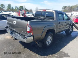 2009 Toyota Tacoma with VIN 3TMLU42N19M024223, listed as a IAAI auction lot 41833027 with 182,206 mi miles and . Bid and sale history available at DreamBid. Image 4.