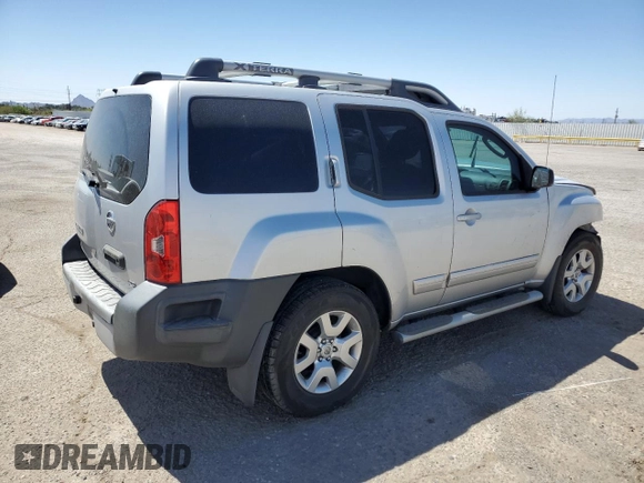 2010 Nissan Xterra S with VIN 5N1AN0NU2AC519838, listed as a Copart auction lot 57301355 with 129,990 mi miles and Salvage title. Bid and sale history available at DreamBid. Image 3.