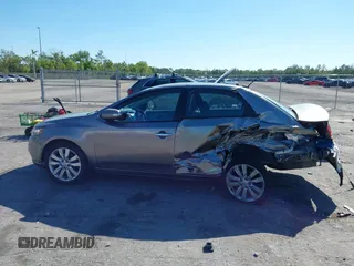 2010 Kia Forte SX with VIN KNAFW4A30A5312314, listed as a IAAI auction lot 41731007 with 169,466 mi miles. Bid and sale history available at carsss.com. Image 13.