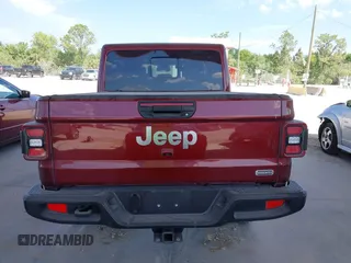 2021 Jeep Gladiator Overland z VIN 1C6HJTFGXML553983, wystawiony jako IAAI lot #41903068 z przebiegiem 54 386 mil mil oraz . Historia ofert i sprzedaży dostępna na DreamBid. Obrazek 16.