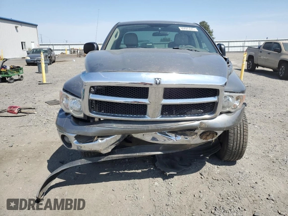 2005 Dodge 1500 SLT z VIN 1D7HU18D05S145030, wystawiony jako Copart lot #60825845 z przebiegiem 91 205 mil mil oraz Szkoda całkowita • Salvage title. Historia ofert i sprzedaży dostępna na DreamBid. Obrazek 5.